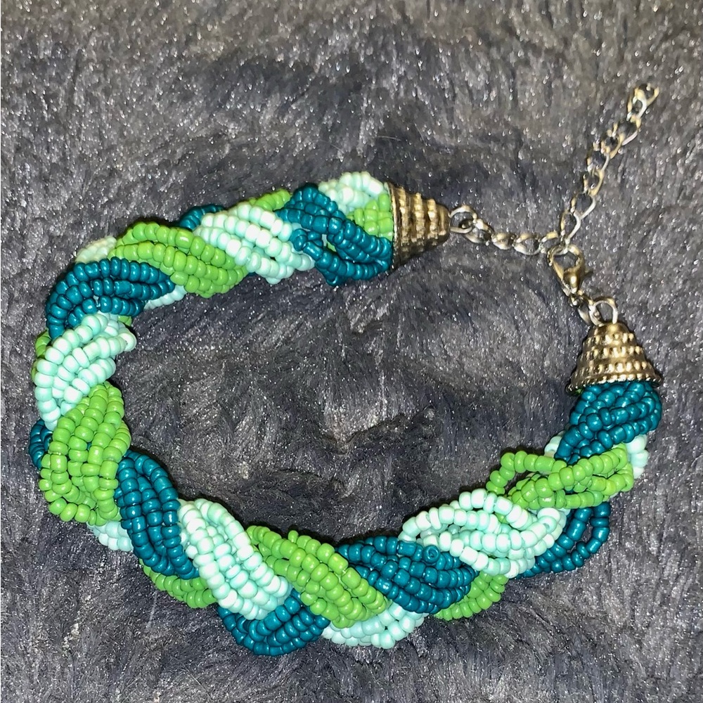 Braided Bracelet with colors of sea green sky blue and turquoise beads.